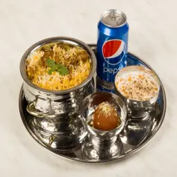 Chicken Biryani + Raita + Gulab Jamun + Soft Drinks		